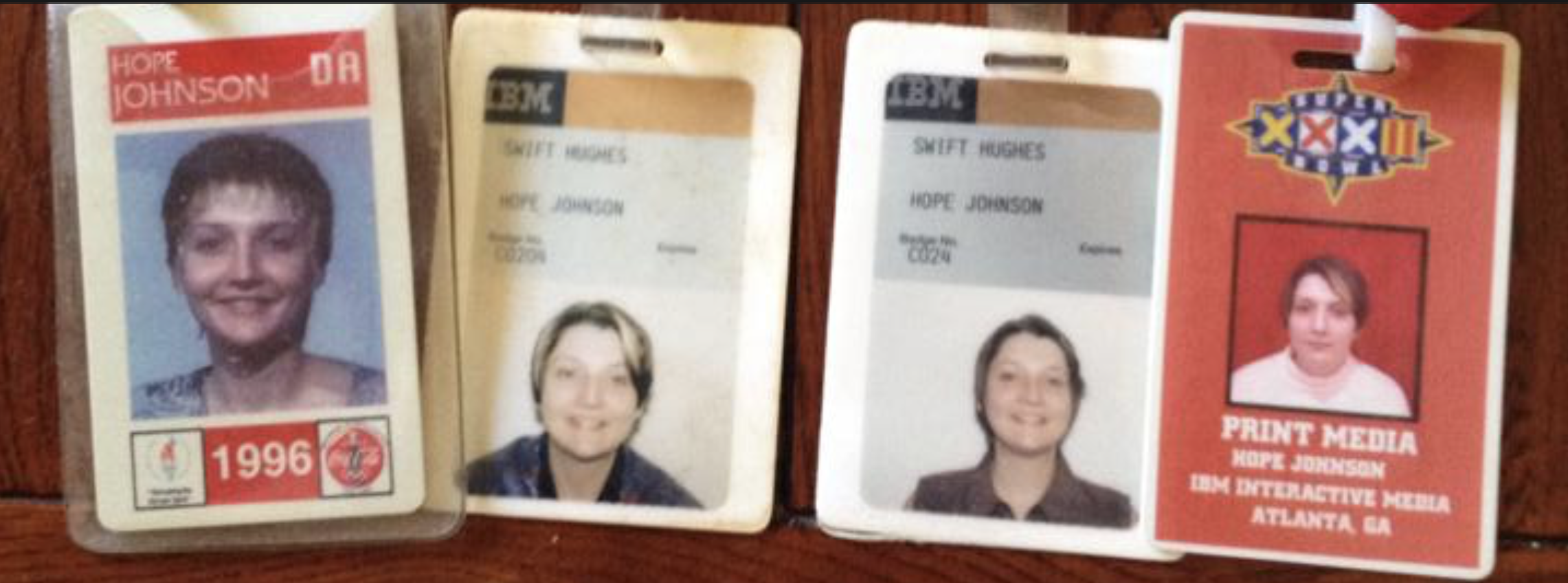 Hope Turner's credential badges from 1996–1999 — 1996 Atlanta Olympics, IBM Interactive Media, and Super Bowl XXXII press credential